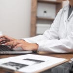 doctor typing