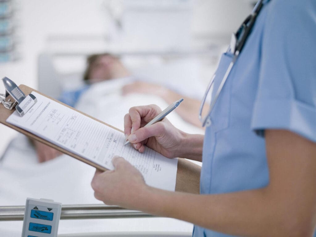 doctor writing notes